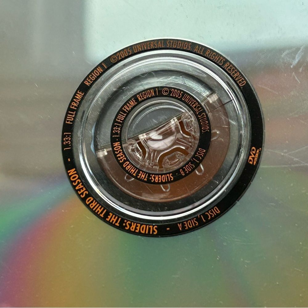 Sliders DVD Set with Colorful Discs - Picture 2 of 3